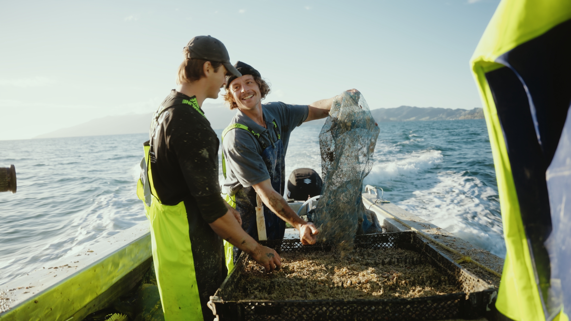 Current Cause crew hauling kaimoana on the water